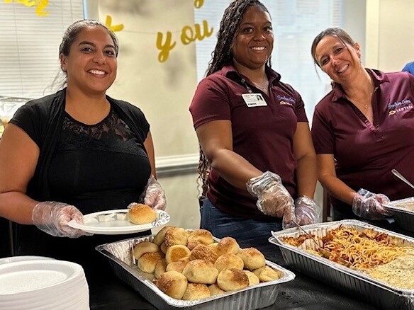 Group of Volunteer serving meal