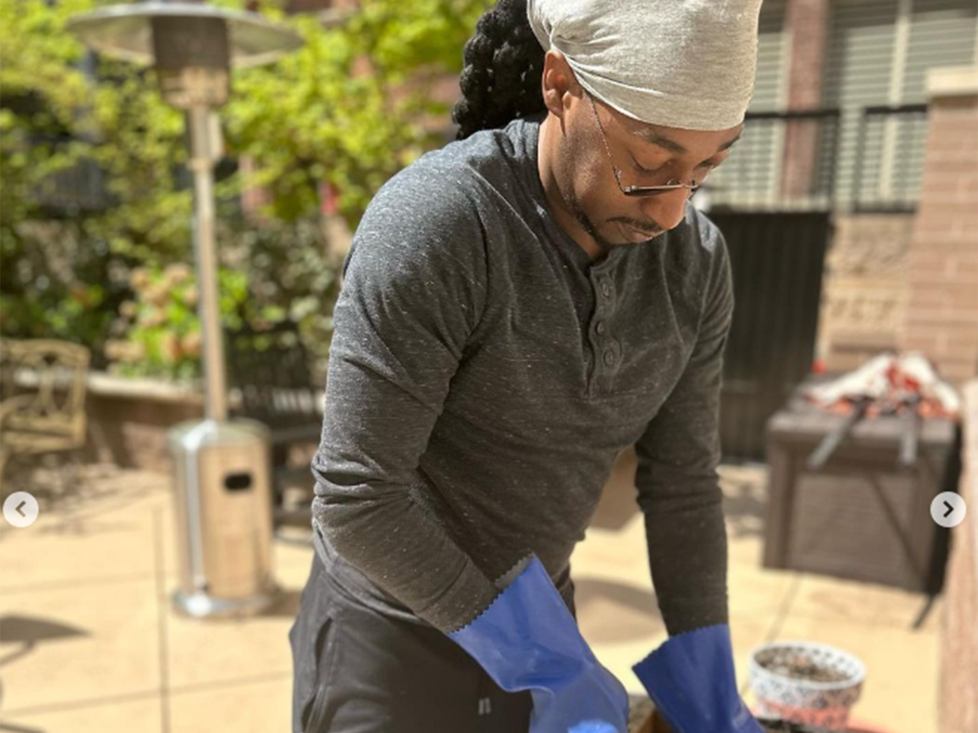 Volunteer working in courtyard