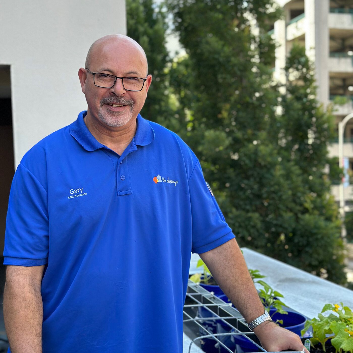 Gary next to The Doorways garden
