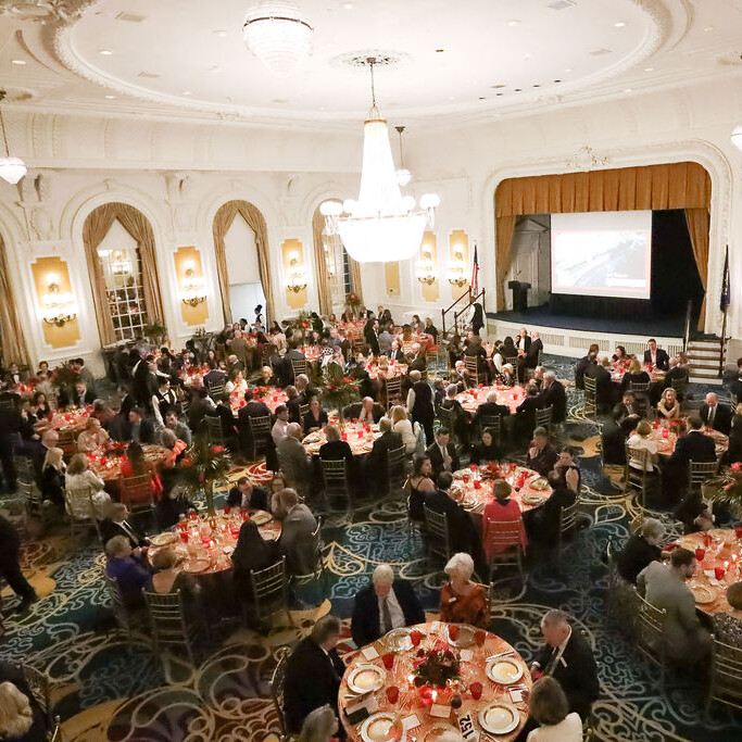 a seated dinner in a ballroom
