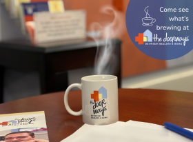 Photo of The Doorways lobby with a coffee cup bearing the logo of The Doorways with steam coming out of it alongside a brochure and the text "Come see what's Brewing at The Doorways"