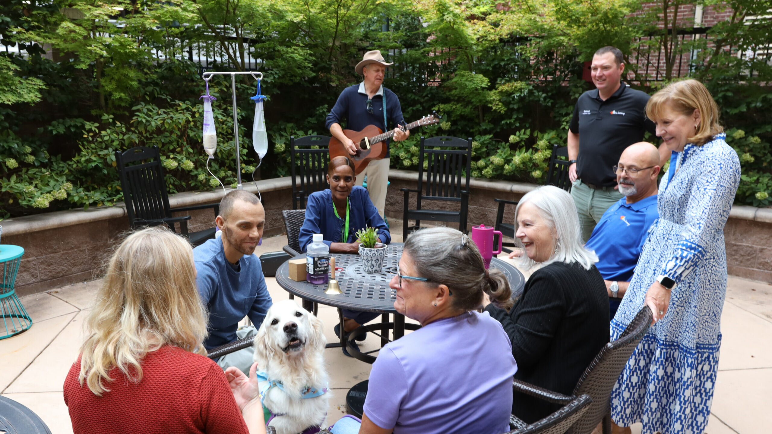 Guests and staff in Dolly's Garden at The Doorways