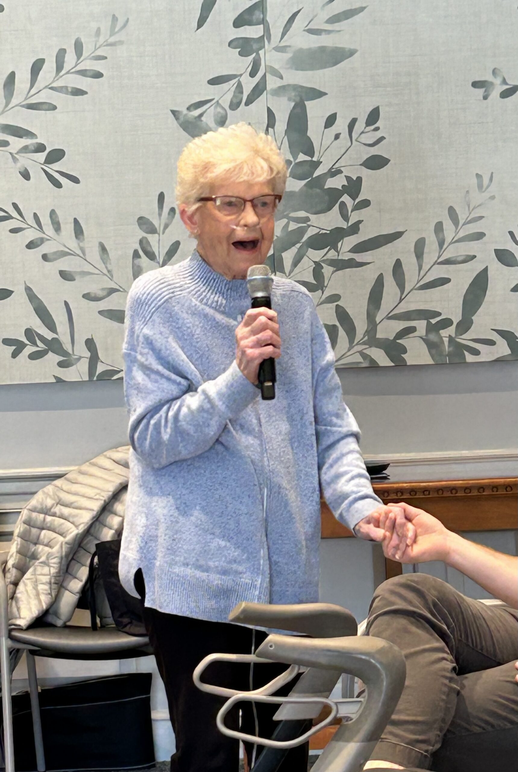 Dolly speaking at an event