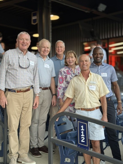 Smiling attendees at the 21st Annual Gilbane Restaurant Walk at CarMax Park