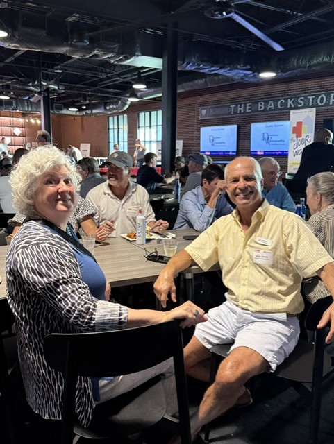Smiling attendees at the 21st Annual Gilbane Restaurant Walk at CarMax Park