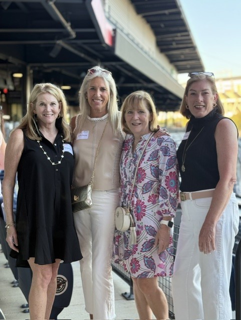 Smiling attendees at the 21st Annual Gilbane Restaurant Walk at CarMax Park