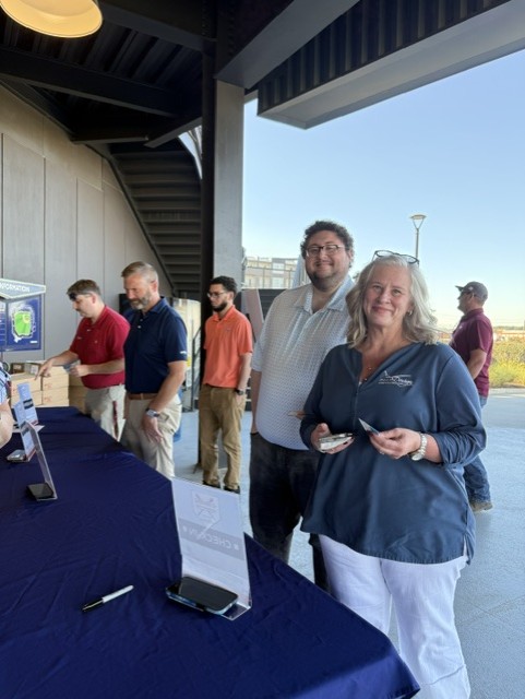 Smiling attendees at the 21st Annual Gilbane Restaurant Walk at CarMax Park
