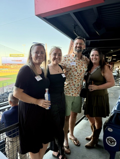 Smiling attendees at the 21st Annual Gilbane Restaurant Walk at CarMax Park