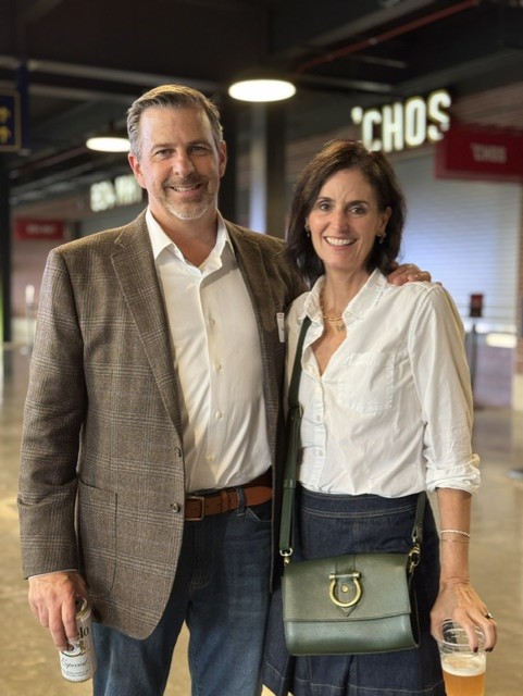 Smiling attendees at the 21st Annual Gilbane Restaurant Walk at CarMax Park