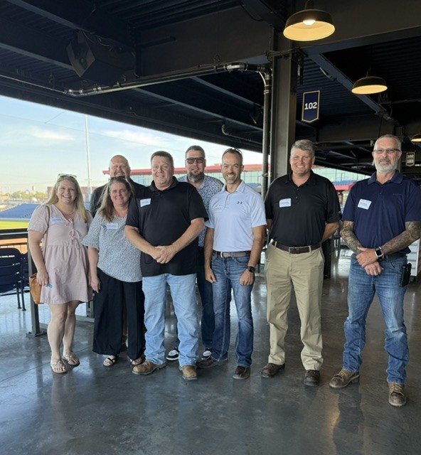 Smiling attendees at the 21st Annual Gilbane Restaurant Walk at CarMax Park