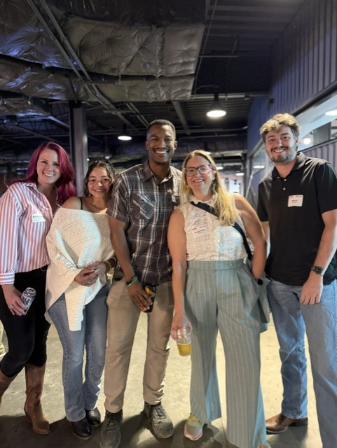 Smiling attendees at the 21st Annual Gilbane Restaurant Walk at CarMax Park