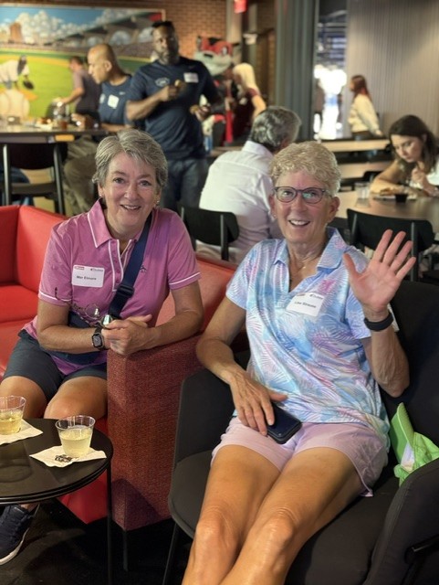 Smiling attendees at the 21st Annual Gilbane Restaurant Walk at CarMax Park