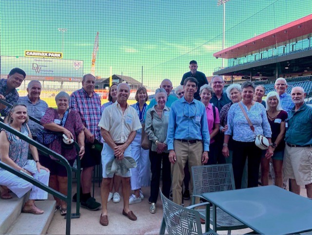 Smiling attendees at the 21st Annual Gilbane Restaurant Walk at CarMax Park