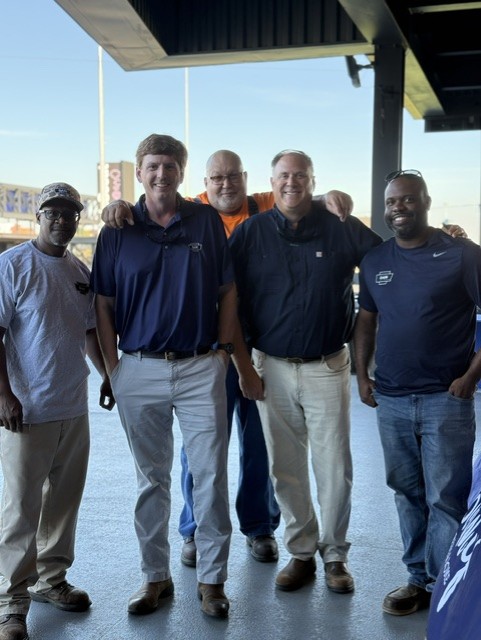 Smiling attendees at the 21st Annual Gilbane Restaurant Walk at CarMax Park