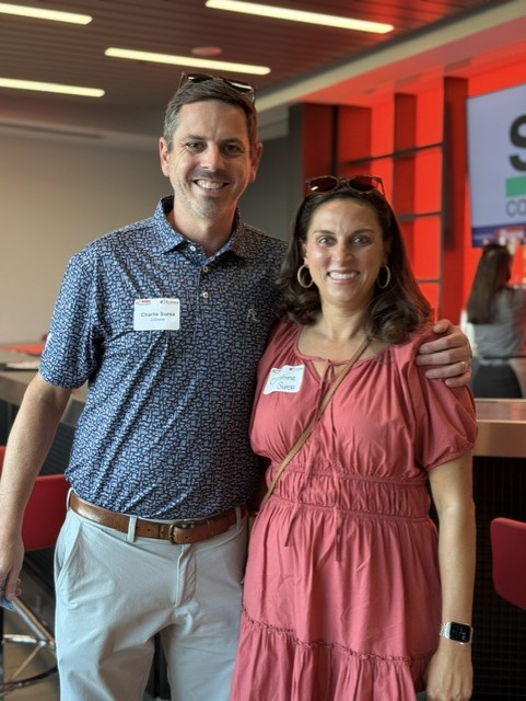 Smiling attendees at the 21st Annual Gilbane Restaurant Walk at CarMax Park