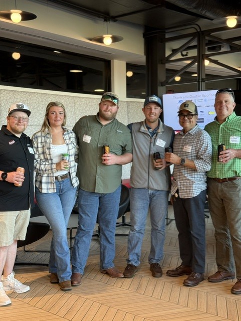 Smiling attendees at the 21st Annual Gilbane Restaurant Walk at CarMax Park