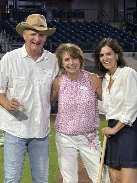 Smiling attendees at the 21st Annual Gilbane Restaurant Walk at CarMax Park