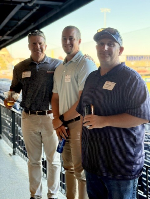 Smiling attendees at the 21st Annual Gilbane Restaurant Walk at CarMax Park