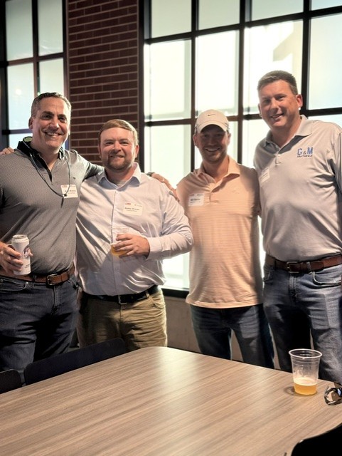 Smiling attendees at the 21st Annual Gilbane Restaurant Walk at CarMax Park