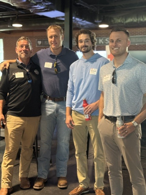 Smiling attendees at the 21st Annual Gilbane Restaurant Walk at CarMax Park