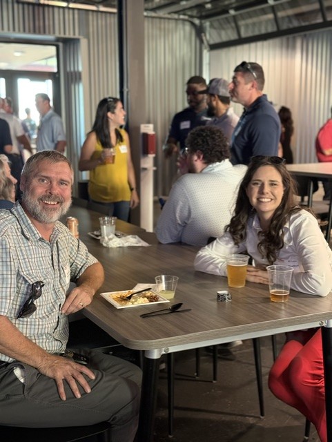 Smiling attendees at the 21st Annual Gilbane Restaurant Walk at CarMax Park